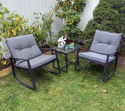 Pyramid Home Decor 3-Piece Rocking Bistro Set - Durable & Stylish Synthetic Wicker Outdoor Furniture - Glass Coffee Table with 2 Chairs for Balcony, Patio & Porch - Black Metal, Soft Gray Cushions