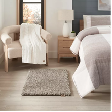 UGG® Chaz 2'3 x 3'8 Shag Accent Rug in Cashew